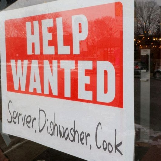 Chicago Federal Reserve building with an economic graph overlay